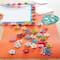 12 Packs: 120 ct. (1,440 total) Bright Multicolored Paper Flower Embellishments by Recollections™